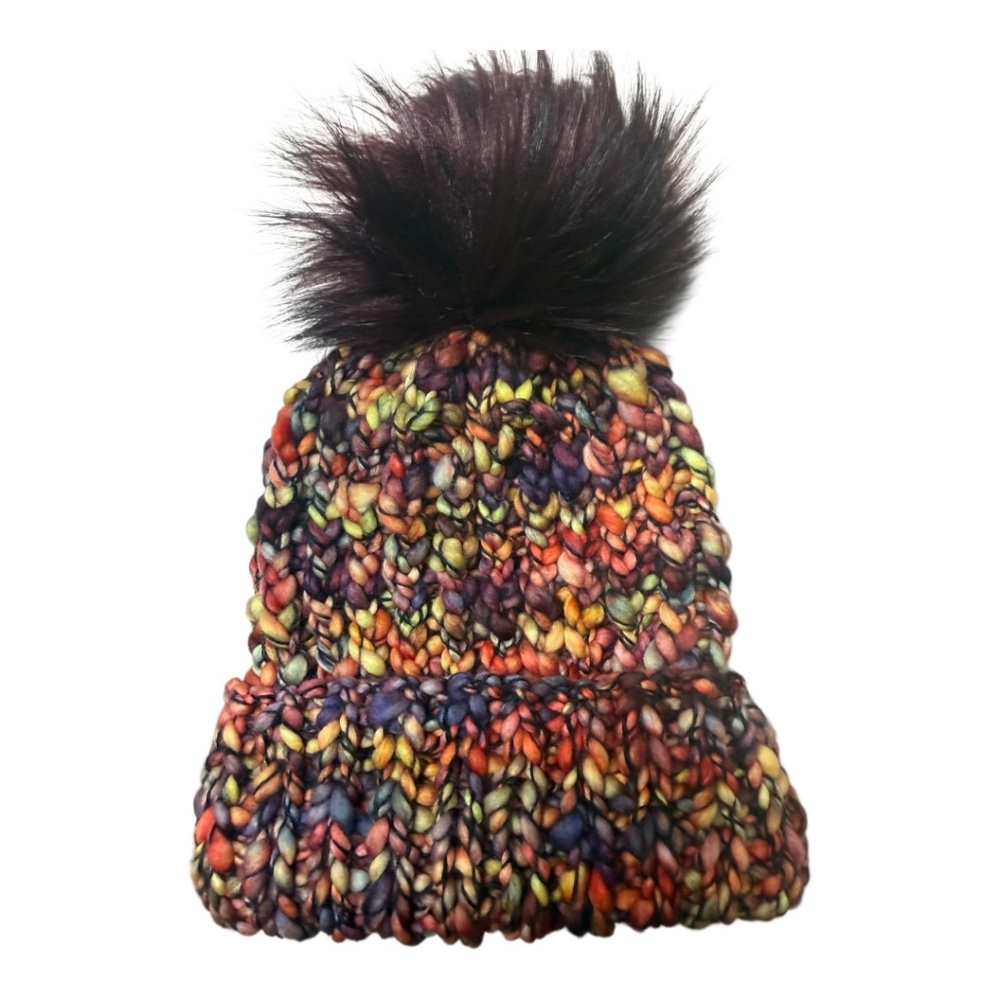 Hand knit variegated knit hat with faux fur pom